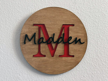 Custom monogram sign with name overlay. Variety of colors and wood stain options to choose from. Makes a great gift for friends, loved ones, teacher appreciation. Approximately 11.75" in diameter. Handmade by Space Rubber Ducky Designs.
