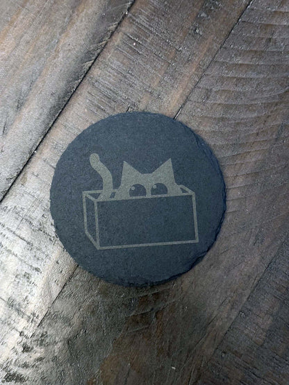 Add humor and style to your home with these laser engraved slate coasters with playful cat designs. The purfect gift, stocking stuffer or house warming gift.