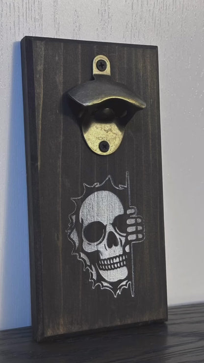 It's spooky season all year long with Mr. Bones peeking around the corner! Each custom magnetic bottle opener is handmade and has hidden rare earth magnets to catch metal bottle caps. Wall-mounted or magnetic backing options. Multiple wood stain choices. Made by Space Rubber Ducky Designs in Southern California, USA.