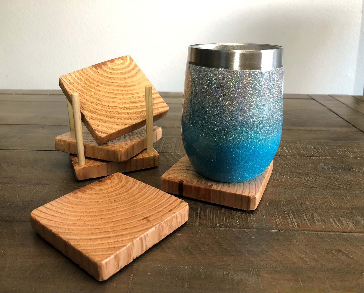 Rustic farmhouse wood coasters. Natural end grain pattern. Charred, burned and distressed. Patriotic red, white and blue distressed and burned.  Set of 4 coasters and holder includes felt food pads. Handmade by Space Rubber Ducky Designs.